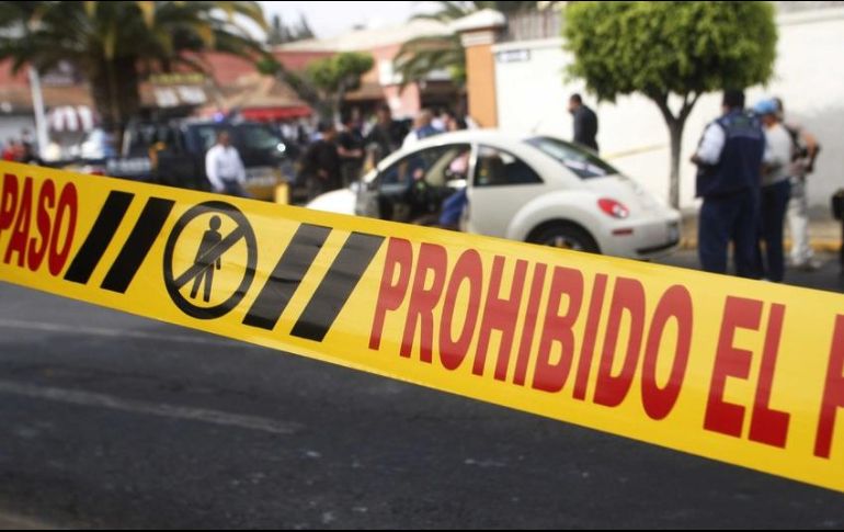 Los peritos de la procuraduría arriban al sitio, ubicado en la alcaldía Cuauhtémoc, para trasladar el cadáver al anfiteatro e identificarlo. EL INFORMADOR / ARCHIVO