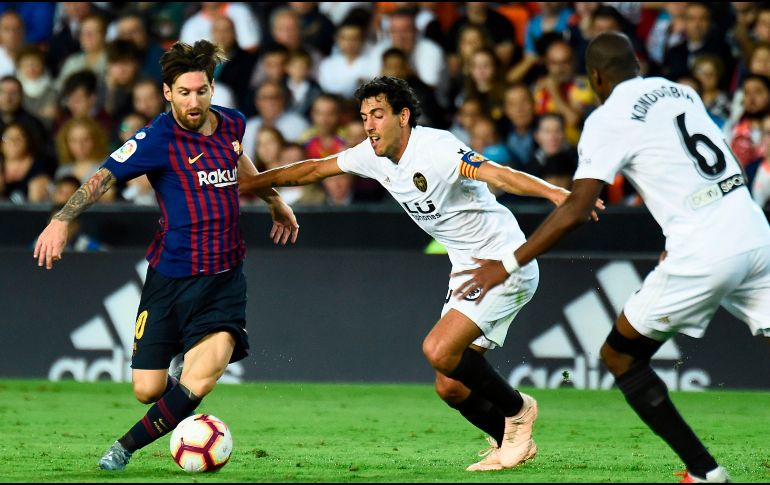 Con el Valencia en ventaja, Messi igualó el marcador con un tanto al 23'. AFP/J. Jordan