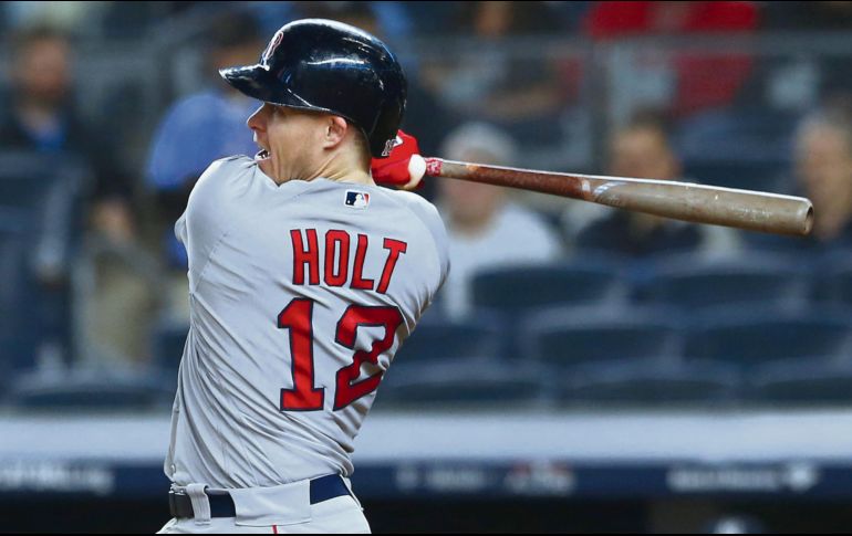 Manny Machado impulsó cuatro de las seis carreras de los Dodgers. AP / J. Bazemore