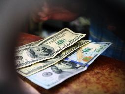 El billete verde se compra en un mínimo de 18 pesos. EL INFORMADOR / ARCHIVO