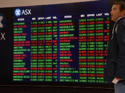 Al término de la jornada accionaria, en la plaza bursátil local se operó un volumen de 298.9 millones de títulos. AFP/P. Parks