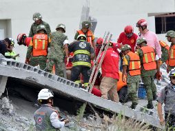 Continúan los trabajos de localización y rescate de más personas, y sigue el proceso de reconocimiento de dos fallecidos, precisando que entre los muertos podrían estar algunos de los no localizados. SUN / E. Vasquez