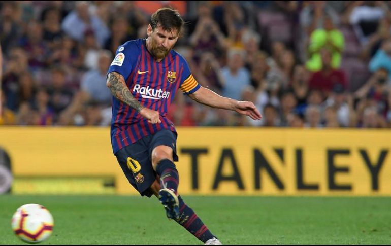 Bajo la dirección de Pep Guardiola, actual técnico del City, Messi ganó un total de 14 trofeos con el Barcelona. AFP/ARCHIVO