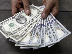 Banxico fijó el tipo de cambio en 18.8096 pesos. EL INFORMADOR / ARCHIVO