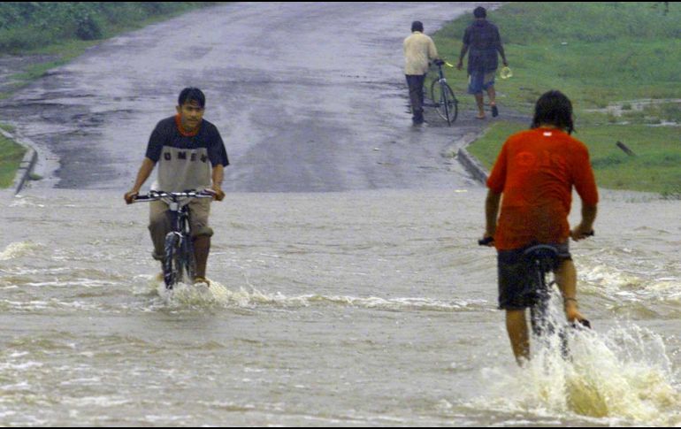 Las lluvias han afectados a 41 de los 153 municipios del país, y a 13 de los 15 departamentos. AFP