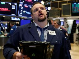 Aunque Wall Street arrancó en verde, a la media hora volvieron las pérdidas. AP / R. Drew