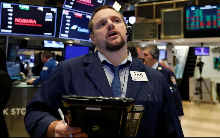 Aunque Wall Street arrancó en verde, a la media hora volvieron las pérdidas. AP / R. Drew