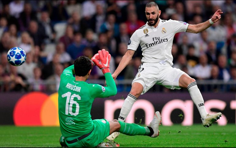Karim Benzema abrió el marcador de cabeza al minuto 11. AFP / J. Soriano