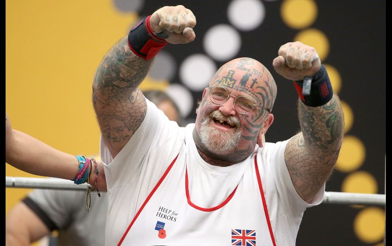 El británico Paul Guest reacciona tras una prueba exitosa de levantamiento de pesas disputada durante los Juegos Invictus para veteranos militares con discapacidades o lesiones, en Sídney, Australia. AP/R. Rycroft