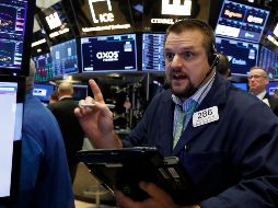El promedio industrial Dow Jones retrocedió 296 unidades, 1.2%, a 24 mil 688. AP / R. Drew