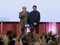 Entre las intenciones de Jair Bolsonaro (derecha) se cuentan la fusión de los despachos de Agricultura y Medio Ambiente y un gran Ministerio de Economía. EFE/A. Cassiano