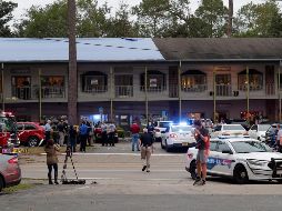 Policías acordonaron la zona para permitir las labores periciales. AP/T. Schneider