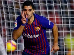Suárez anotó su segundo tanto aprovechando un centro de Sergi Roberto. AFP/B. Cremel