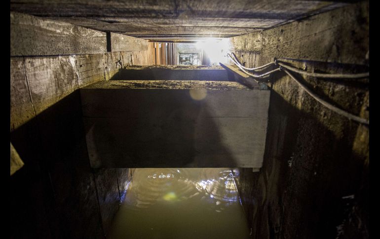 Guzmán escapó por un túnel debajo de la casa, que conectaba con el sistema de drenaje de la ciudad. AFP/ARCHIVO