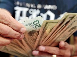 Se adquirió en un precio mínimo de 18.60 pesos en bancos de la Ciudad de México. EL INFORMADOR / ARCHIVO