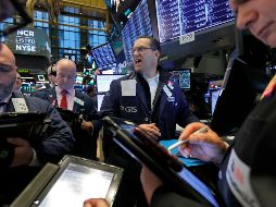 El NYSE Composite retrocede 31.99 puntos, colocándose en 12 mil 647.11 unidades. AP / R. Drew