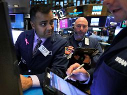 El Dow Jones consiguió anular los 200 puntos que había bajado en las primeras horas de la sesión bursátil para acabar con un avance de otros 200 puntos. AP/R. Drew