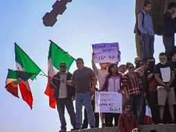 El domingo, cerca de 400 personas se dieron cita en la glorieta de Cuauhtémoc, situada en la principal vialidad de la ciudad fronteriza, para manifestarse contra la llegada de migrantes a la localidad. SUN / J. Terríquez