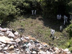 En su dictamen, el equipo argentino estableció la presencia de restos humanos en el basurero de Cocula; sin embargo, indicó que no se pudo establecer con certeza que alguno de los restos encontrados correspondiera a los estudiantes normalistas. EL INFORMADOR / ARCHIVO