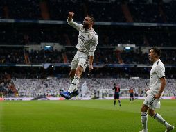 Carvajal (I) celebra tras propiciar un autogol de Wass. AP/P. White