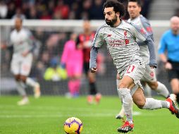 Las anotaciones de Salah caen en los minutos 23, 48 y 68 de tiempo corrido, mientras que el último tanto fue un autogol de Steve Cook en el minuto 77. AFP / G. Kirk