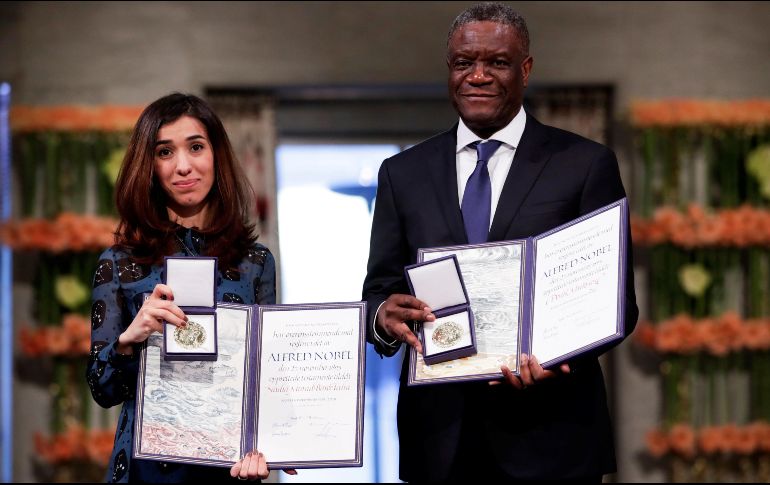 Mukwege (d) y Murad hicieron un llamado para que haya una mayor acción internacional contra el abuso, incluidas indemnizaciones para las víctimas. EFE/ H. Larsen