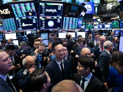 El índice compuesto Nasdaq ganó 66 puntos, 0.9%, y cerró en 7,098. AP / M. Lennihan