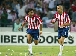 Bautista (D) fue protagonista de la goleada 4-0 a Boca Juniors en la Copa Libertadores de 2005, uno de los logros internacionales más memorables del Rebaño. EL INFORMADOR/ARCHIVO