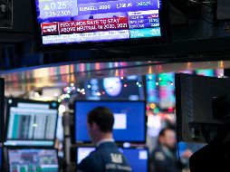 La sesión de hoy en Wall empezó bien y el Dow Jones llegó a subir 350 puntos, pero los anuncios de la Fed afectaron los indicadores. AP/M. Lennihan