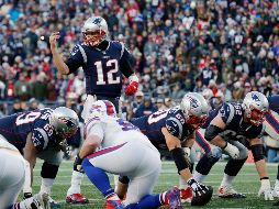 Tom Brady completó 13 de 24 pases para 126 yardas y un touchdown. AFP / J. Rogash