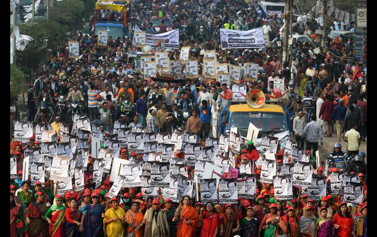 Seguidores del partido Liga Awami de Bangladesh marchan en Dacca, previo a las elecciones generales del 30 de diciembre. AFP/M. Uz Zaman
