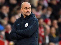 El City, dirigido por Guardiola, tiene siete puntos menos que el Liverpool, lider del campeonato inglés. AFP/G. Kirk