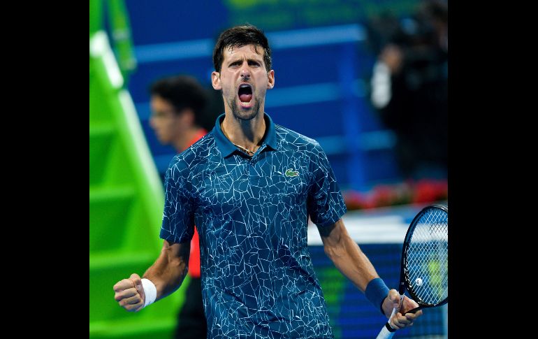 El tenista serbio Novak Djokovic celebra su victoria ante el georgiano Nikoloz Basilashvili durante el partido de cuartos de final del Torneo de Doha, que ambos disputaron en Doha, Qatar. EFE/N. Thekkayil