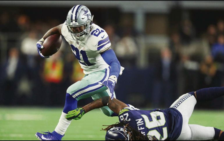 El corredor de los Cowboys terminó con 137 yardas y un touchdown en 26 acarreos en el juego de ayer ante los Seahawks. AFP