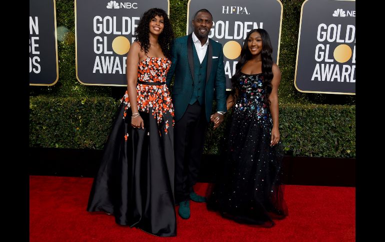 Idris Elba con su hija Isan Elba (d) y Sabrina Dhowre.