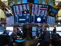 El promedio industrial Dow Jones avanzó 98 enteros, y cerró en 23 mil 531 unidades. AFP/B. Smith