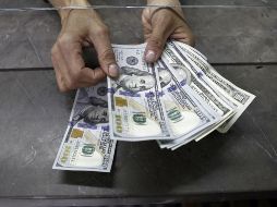 El billete verde se adquirió en un precio mínimo de 18.20 pesos. EL INFORMADOR / ARCHIVO