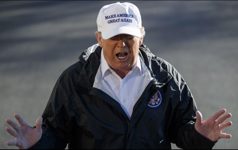 Trump fue entrevistado antes de que partiera para visitar la frontera con México. EFE / S. THEW