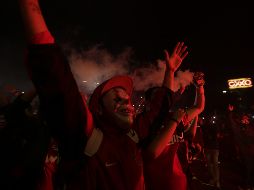La afición del Atlas recibió a su equipo en medio de cánticos y luces de bengala. EL INFORMADOR / F. Atilano