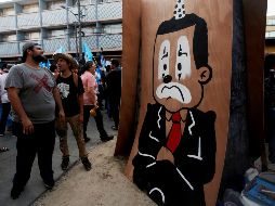 Vista de una pintura satírica que representa a Jimmy Morales, durante una marcha para defender el acuerdo del Gobierno y la ONU sobre la Comisión Internacional Contra la Impunidad en Guatemala. EFE/E. Biba