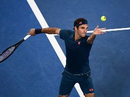 Federer, quien podría conseguir en Melbourne su título 100 ATP y su tercer Abierto de Australia consecutivo, se enfrentará en la siguiente ronda con el británico Daniel Evans. AFP / J. Samad