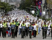 Las marchas del domingo en todo el país fueron promovidas como una muestra no partidista de unidad contra la violencia. EFE / L. Noriega