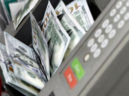 El dólar se vendió cuatro centavos menos en relación con el cierre de ayer. EL INFORMADOR/ARCHIVO