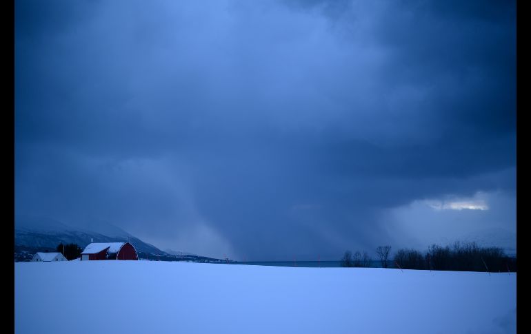 Casas de madera a las afueras de Tromso, ubicada en el Ártico noruego. En el invierno, las temperaturas en la región son de entre -5 y -10 grados centígrados. AFP/O. Morin