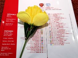 El nombre del delantero fue incluido en el programa del partido al lado de una flor, que también fue entregada a los periodistas acreditados al encuentro. AP / N. Potts