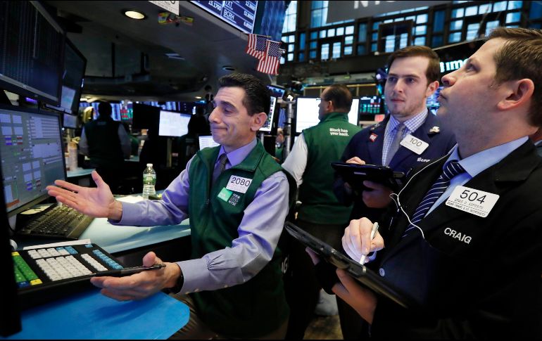El Dow finalizó con una firme ganancia de 434.90 unidades. AP/R. Drew