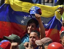 Guaidó llamó a las fuerzas armadas y civiles a actuar ante la crisis humanitaria en Venezuela. AFP/Y. Cortez