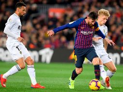 Tras el descanso, el Barcelona consiguió igualar el marcador con un gol de Messi, que marcó con un disparo desde el borde del área en el minuto 64. AFP / L. Gene