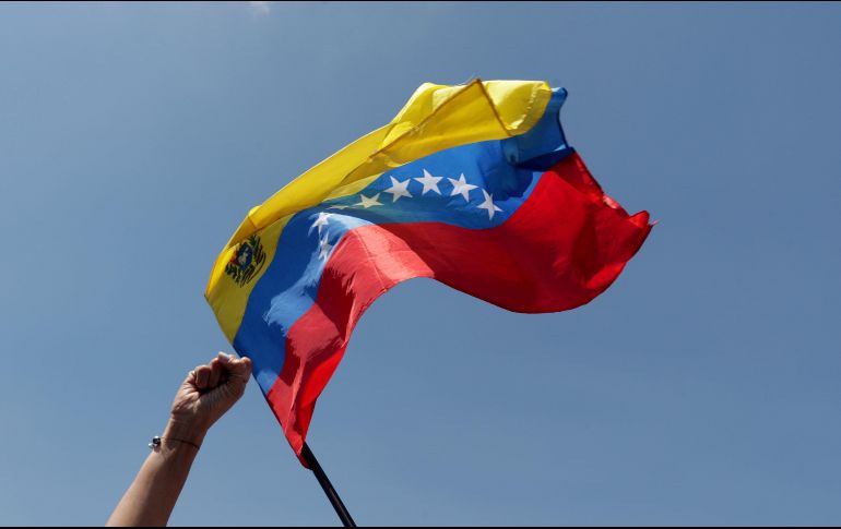 Las movilizaciones no sólo ocurrieron en Venezuela, pues en otros países también se organizaron manifestaciones para presionar la salida de Maduro. EFE/L. Muñoz