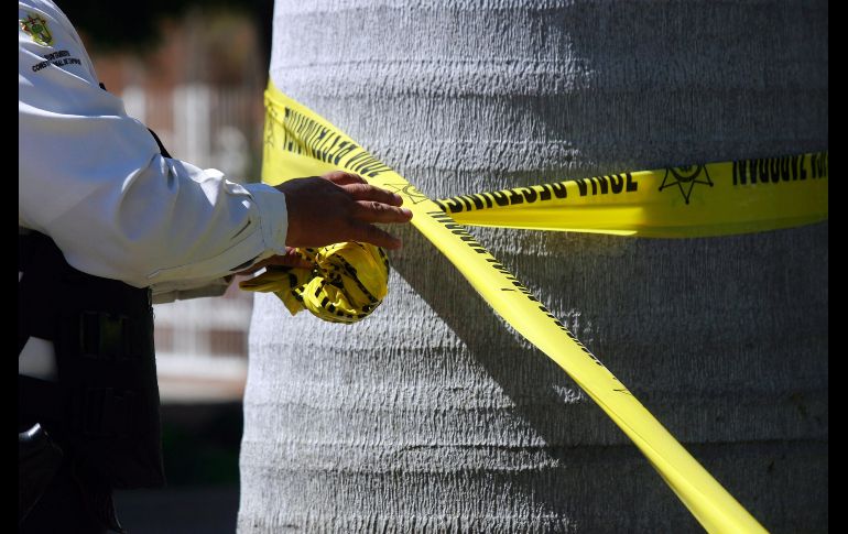Los policías  repelieron la agresión en defensa de sus vidas, pero no pudieron alcanzar a los hombres armados. EL INFORMADOR / ARCHIVO